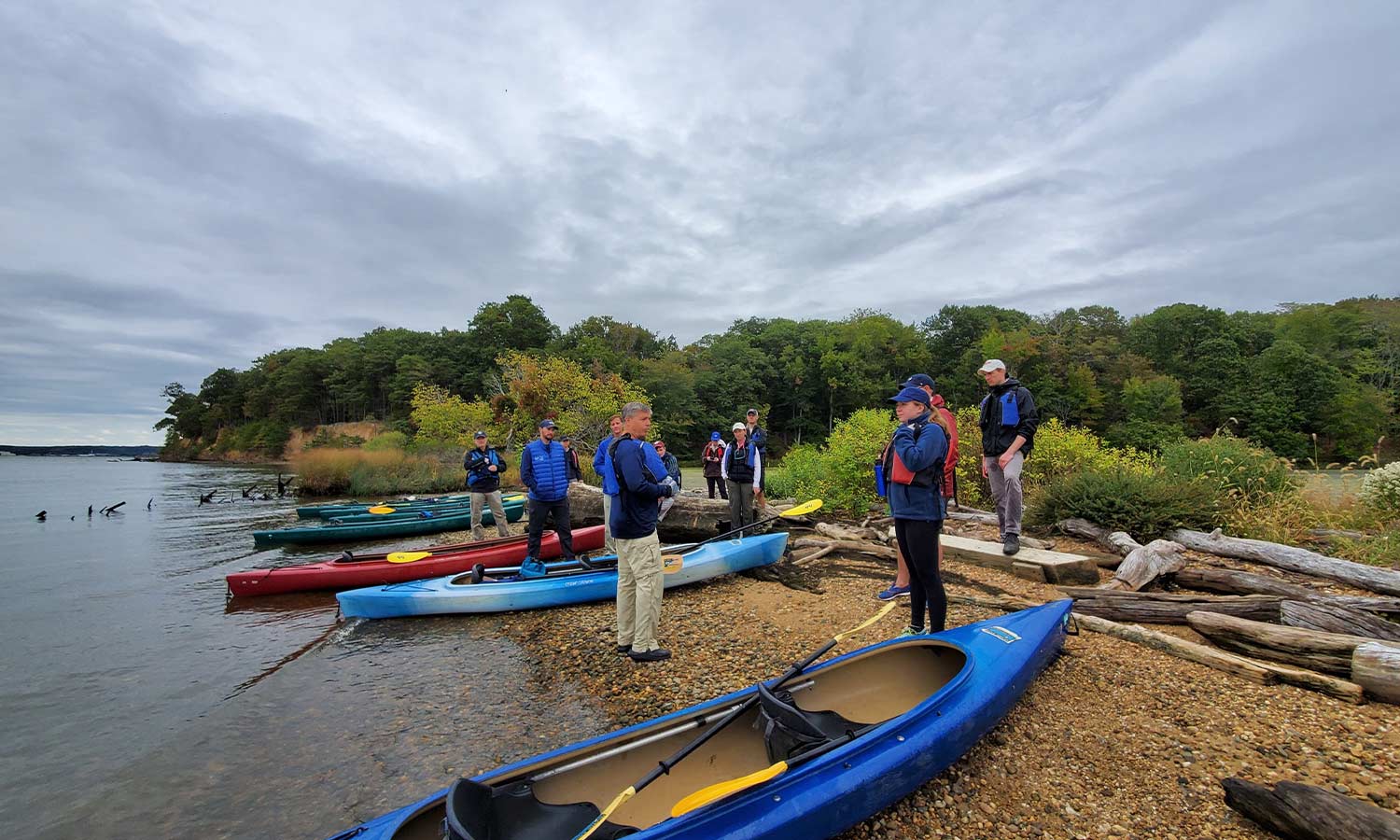 On the Shore with Kayakers