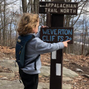 Child at Trail Sign