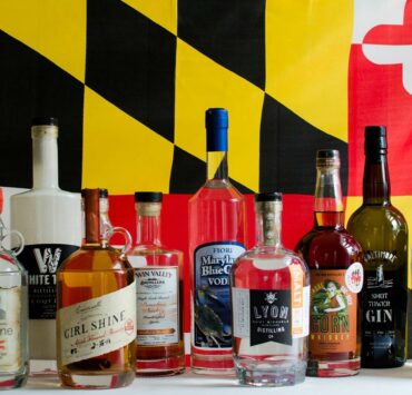 Maryland Liquor Bottles in front of the MD Flag