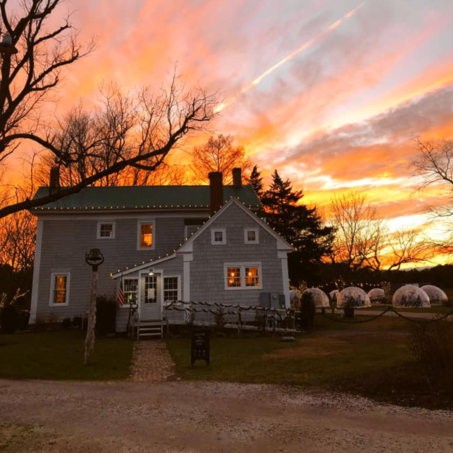 House in front of a sunset