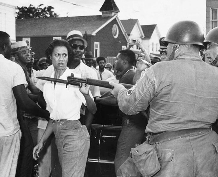 Gloria Richardson and protestors facing National Guard troops, Cambridge, Maryland, ca. 1963