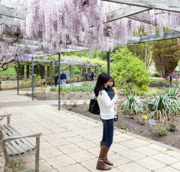 Mom and daughter surrounded by plants