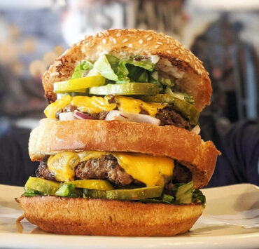 The “Drive Thru Burger” at Nepenthe Brewing Co. is inspired by McDonald’s Big Mac