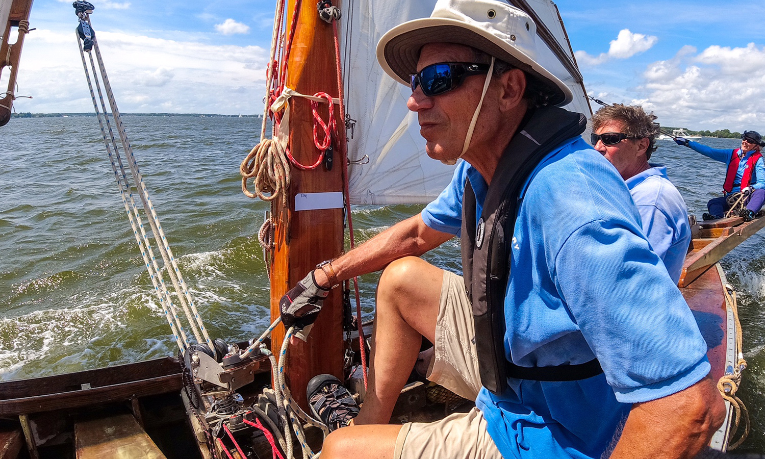 Man sitting on a boat in the water