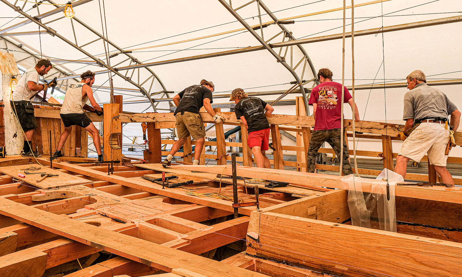 Group of people working on the boat
