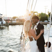 A couple kissing on a boat