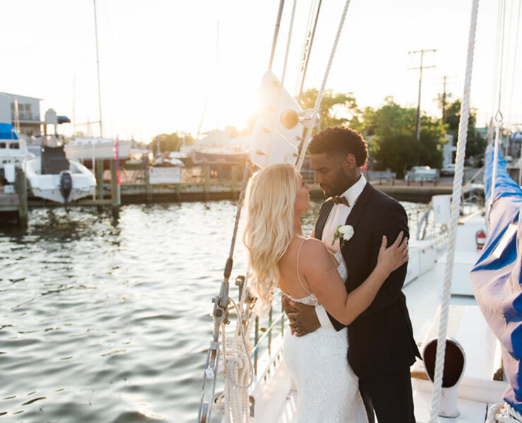 A couple kissing on a boat