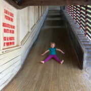 girl going down slide