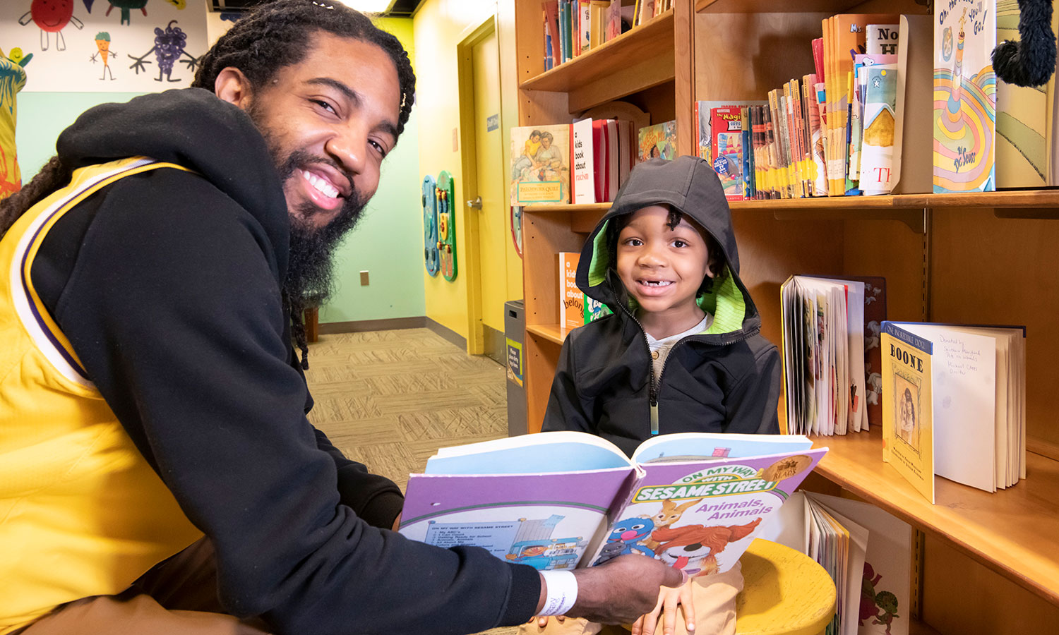 dad and kid reading