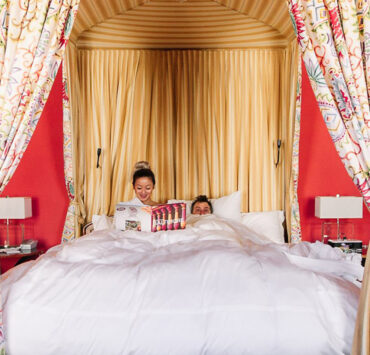 couple in bed at The Ivy Hotel