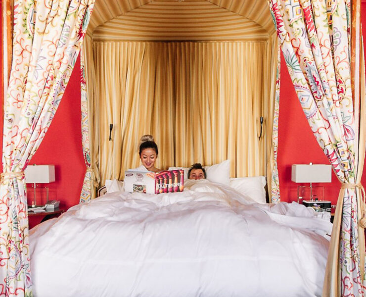 couple in bed at The Ivy Hotel