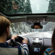couple driving in snow