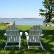 two white Adirondack chairs