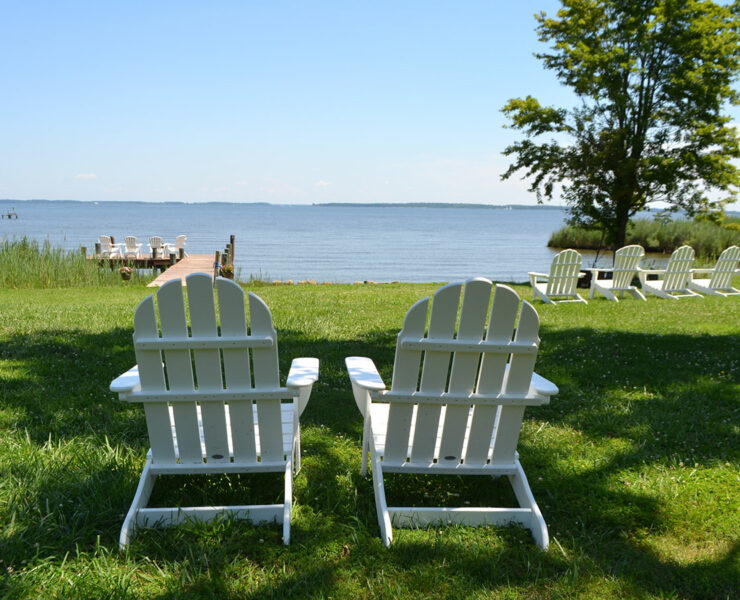 two white Adirondack chairs
