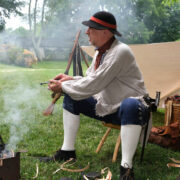 history reenactment by a fire