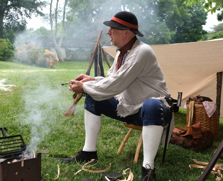 history reenactment by a fire