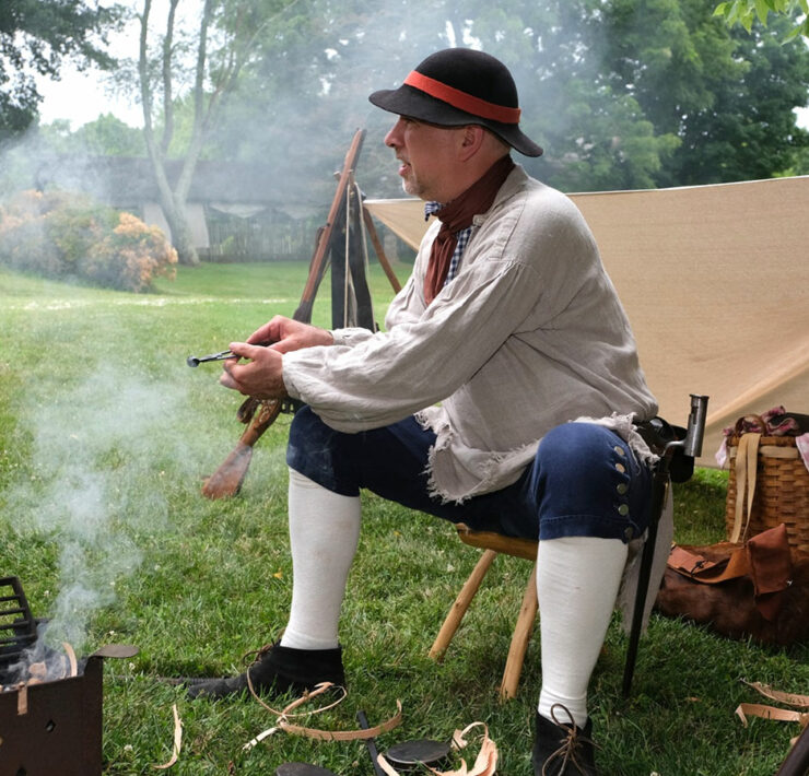 history reenactment by a fire