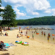 people playing on the beach at Deep Creek Lake