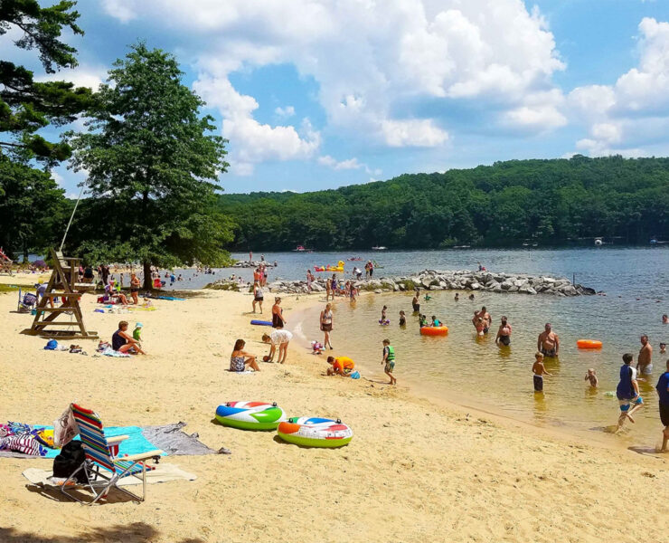 people playing on the beach at Deep Creek Lake
