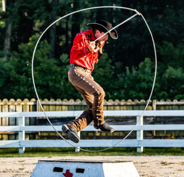 cowboy jumping through rope