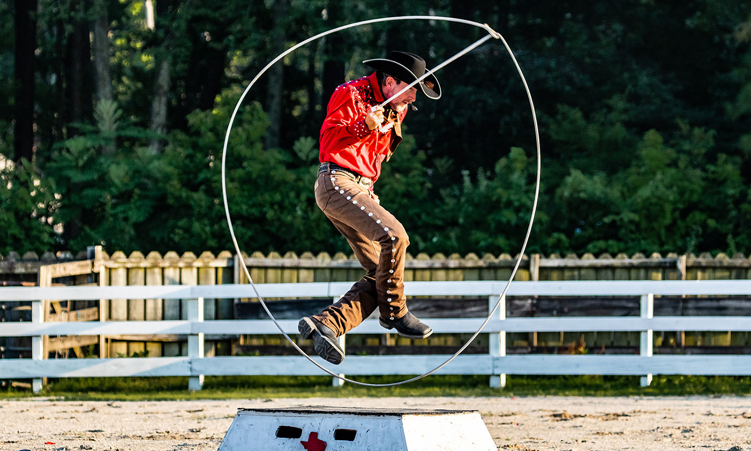 cowboy jumping through rope