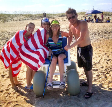 author and family on the beach