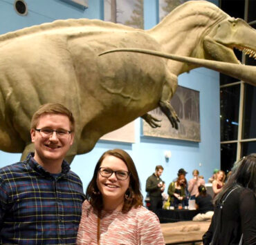 couple with dinosaurs