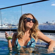 The outdoor pool at Sagamore Pendry overlooks the Inner Harbor in Baltimore, MD