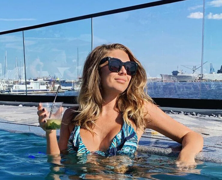 The outdoor pool at Sagamore Pendry overlooks the Inner Harbor in Baltimore, MD