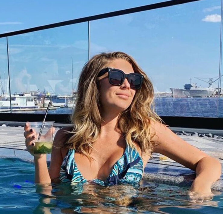 The outdoor pool at Sagamore Pendry overlooks the Inner Harbor in Baltimore, MD