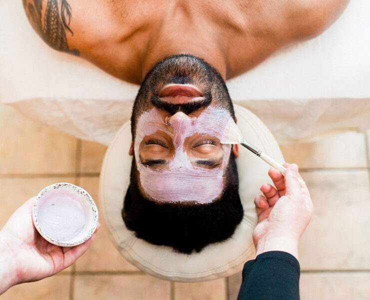 Man receiving a facial at The Spa at Turf Valley