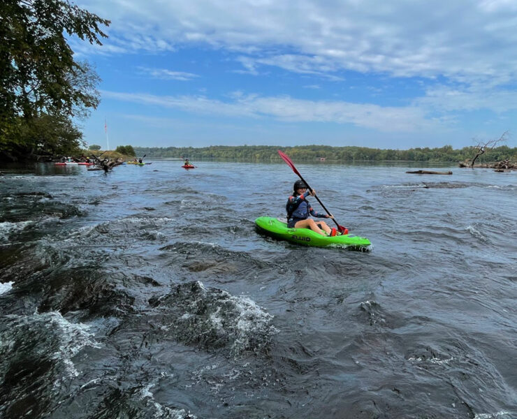 Lone kayaker on the water