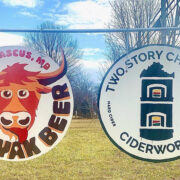 wo Story Chimney Ciderworks and Silly Yak Beer Company signs