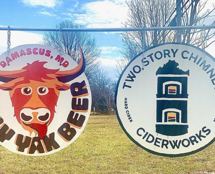 wo Story Chimney Ciderworks and Silly Yak Beer Company signs