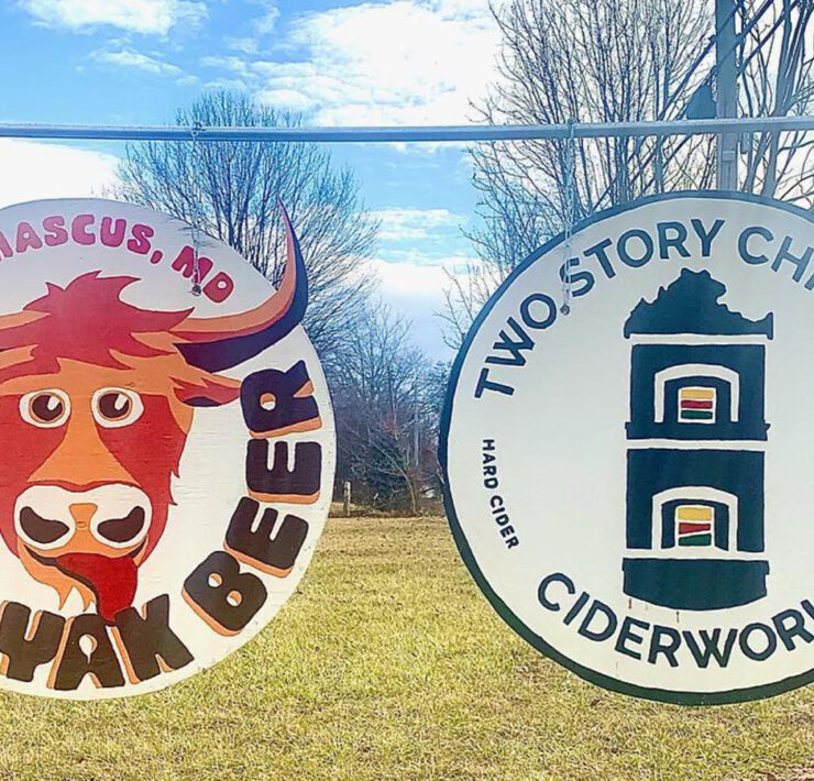 wo Story Chimney Ciderworks and Silly Yak Beer Company signs