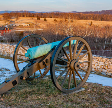 Civial war cannon on a ridge during winter