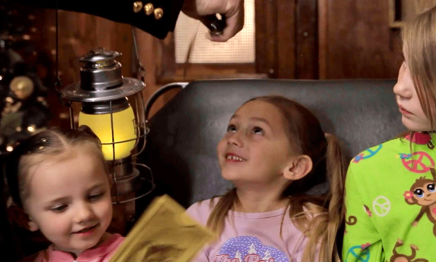 Little children enjoying polar express ride