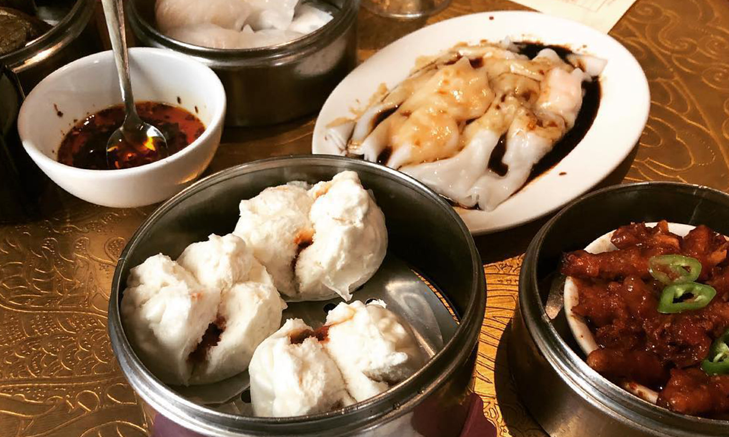 Spread of dim sum dishes