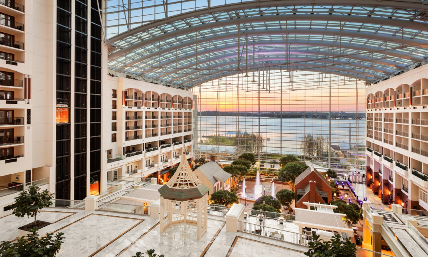 Inside of massive resort lobby with glass ceiling