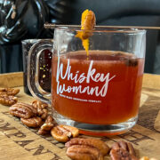 Hot toddy cocktail on a barrel at a distillery