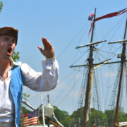 Actor in period clothing at festival