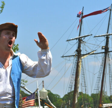 Actor in period clothing at festival