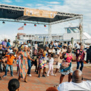 Huge crowd of people dancing in front of a stage