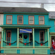 Outside of a green bookstore