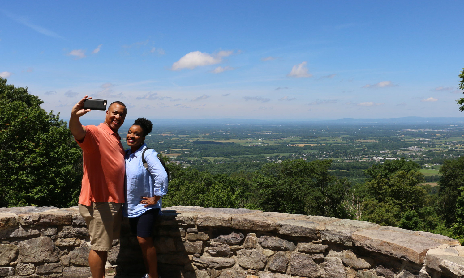 Couple taking at selfie at an overlook